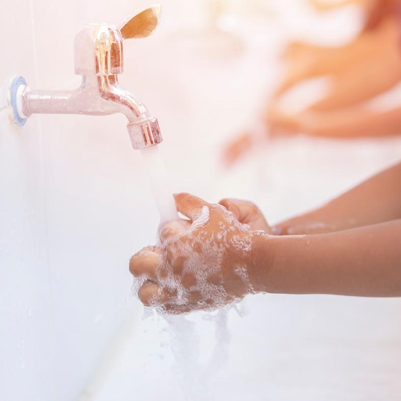 Washing hands at a tap — everyday use of drinking water